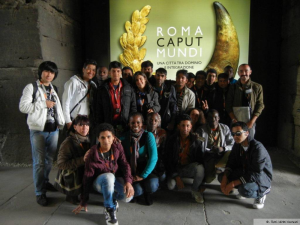 Immigrati in visita alla Mostra Roma Caput Mundi